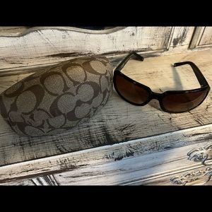 Woman Coach Sunglasses with matching case.